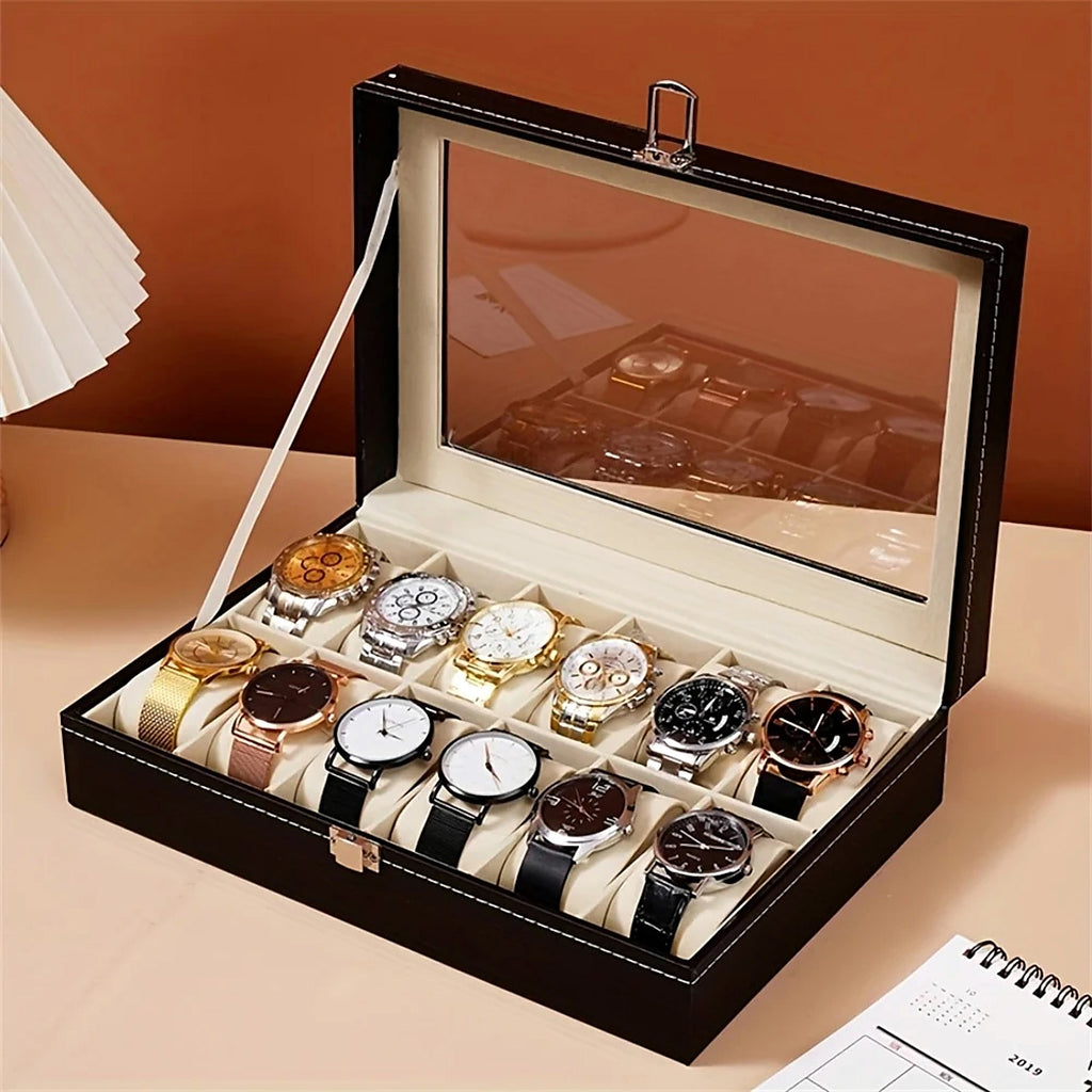 Coffret à montres 12 emplacements en cuir noir, avec serrure : avec 12 montres, sur un bureau